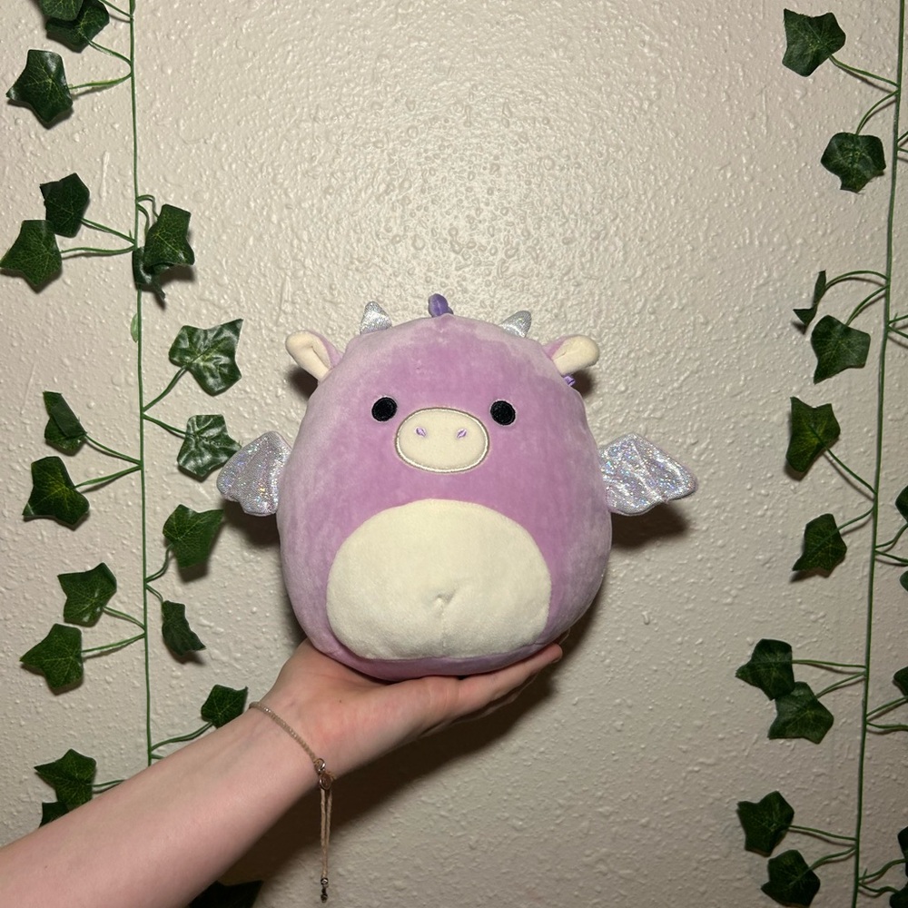 8 inch Dina, the dragon squishmallow message me for more details.